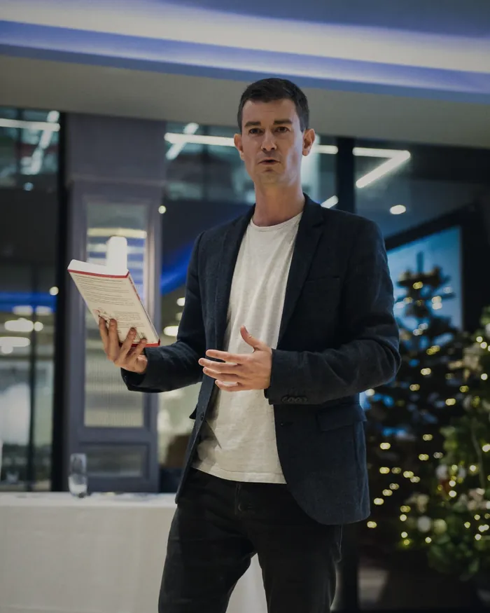 Christian Rodwell reading from Sack Your Boss at the book launch at The Eight Club, London