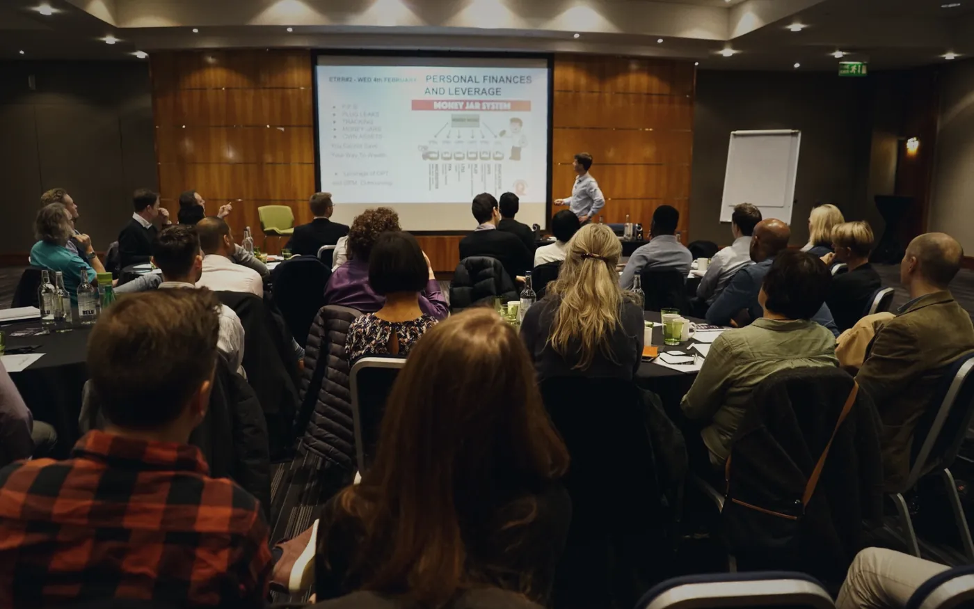 Christian Rodwell presenting to a full room at Escape the Rat Race meetup #2 in London